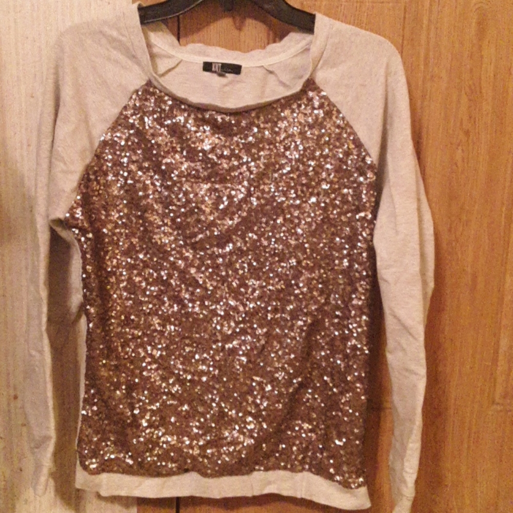 A grey and brown long sleeve